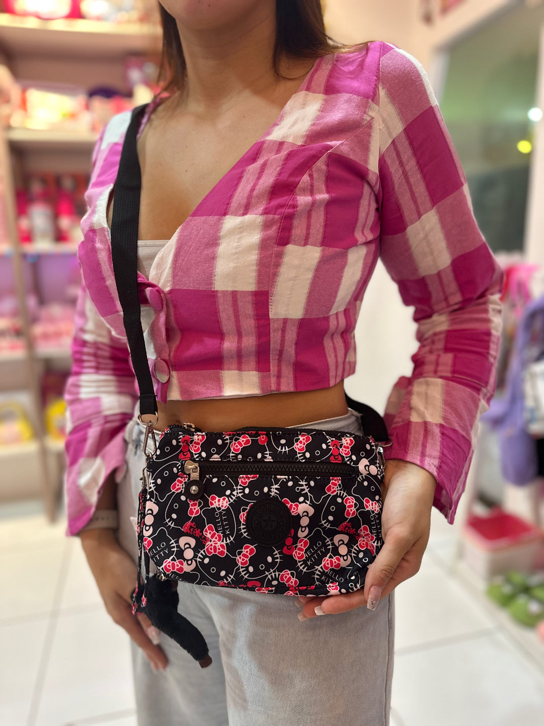 BOLSINHA KIPLING TIRA COLO, ALÇA REMOVÍVEL E REGULÁVEL