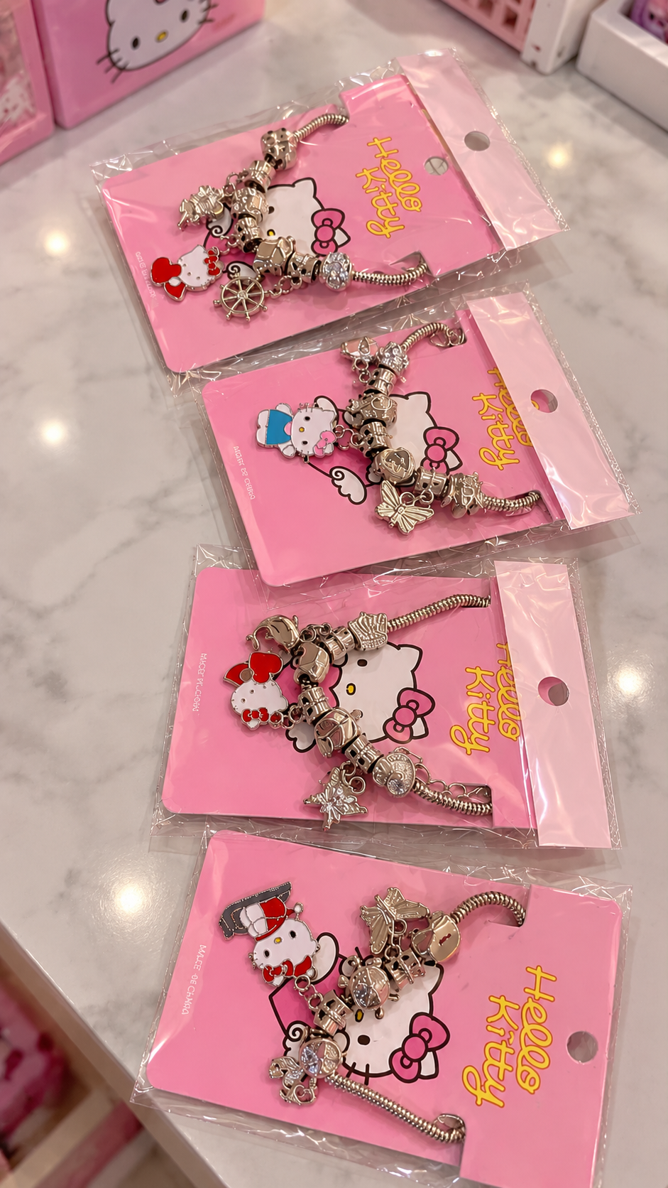 PULSEIRA HELLO KITTY COM BERLOQUE
